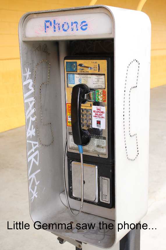 Pay Phone with Graffiti