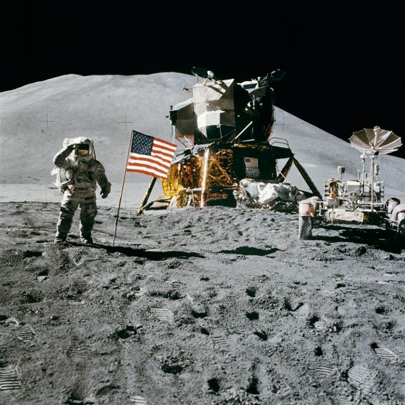 Apollo 15 Lunar Module Pilot James Irwin salutes the U.S. flag.